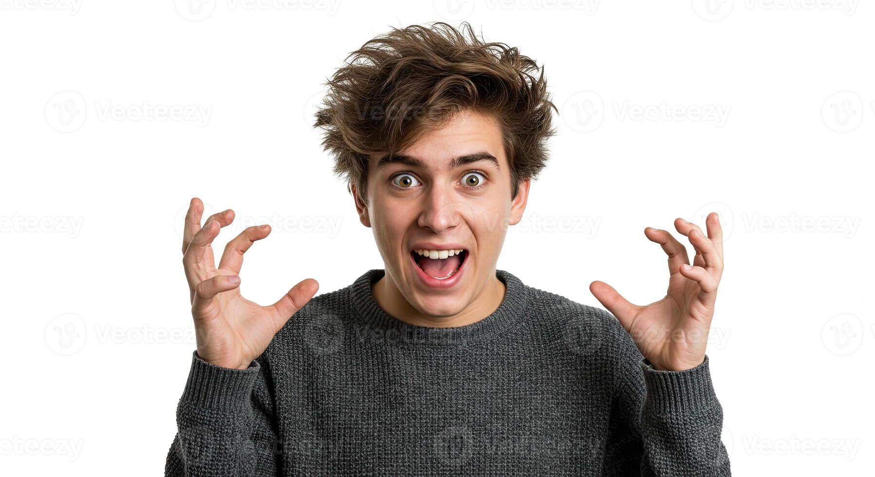 Young man expresses extreme excitement with wild hand gestures and expression photo