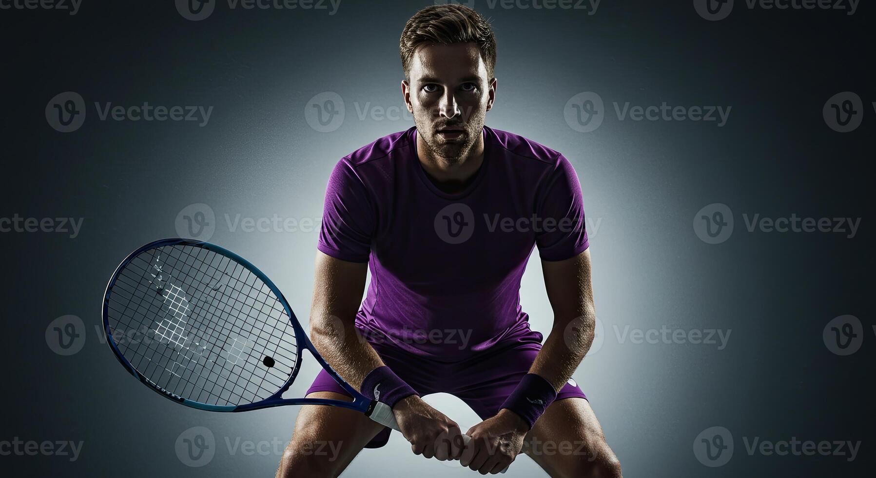 Focused tennis player ready to serve with intense gaze and powerful stance photo