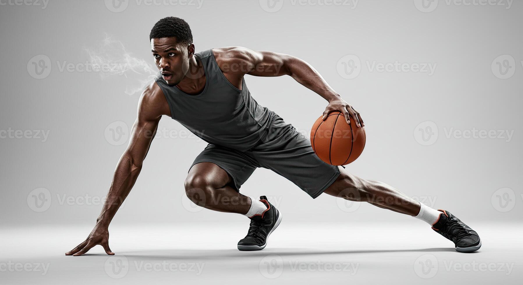 Muscular African American basketball player dribbling with power and focus photo