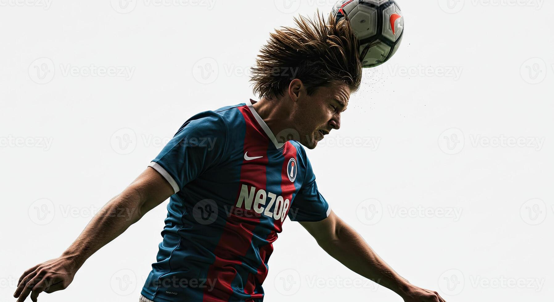 Soccer player heading the ball in a dynamic, action-packed moment against sky photo