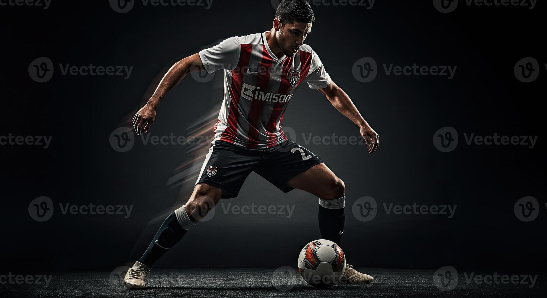 Soccer player in dynamic action dribbling the ball with intense focus photo