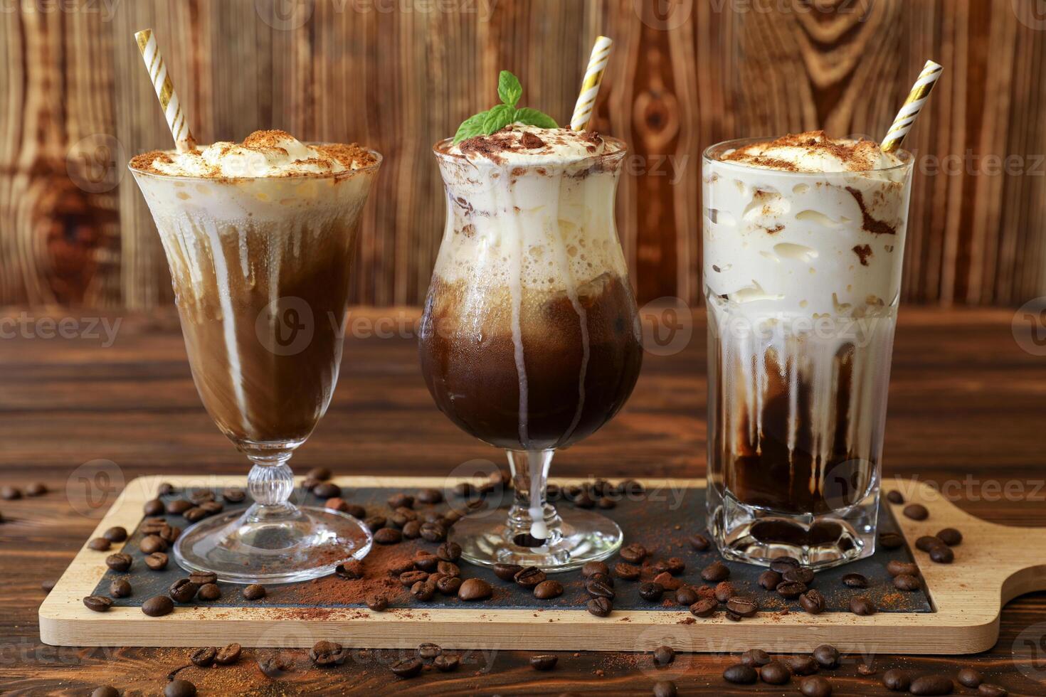 Three delicious coffee beverages are displayed on wooden board, showcasing rich colors and creamy textures. Each drink features unique toppings and presentation. photo