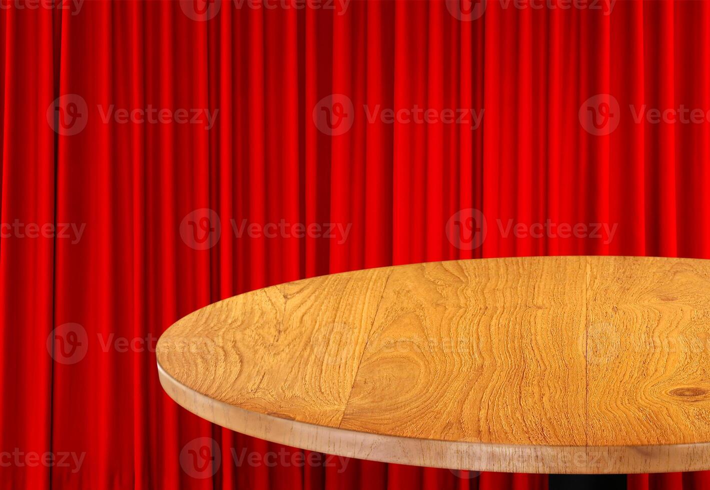 Round wooden table corner, red curtain background. photo