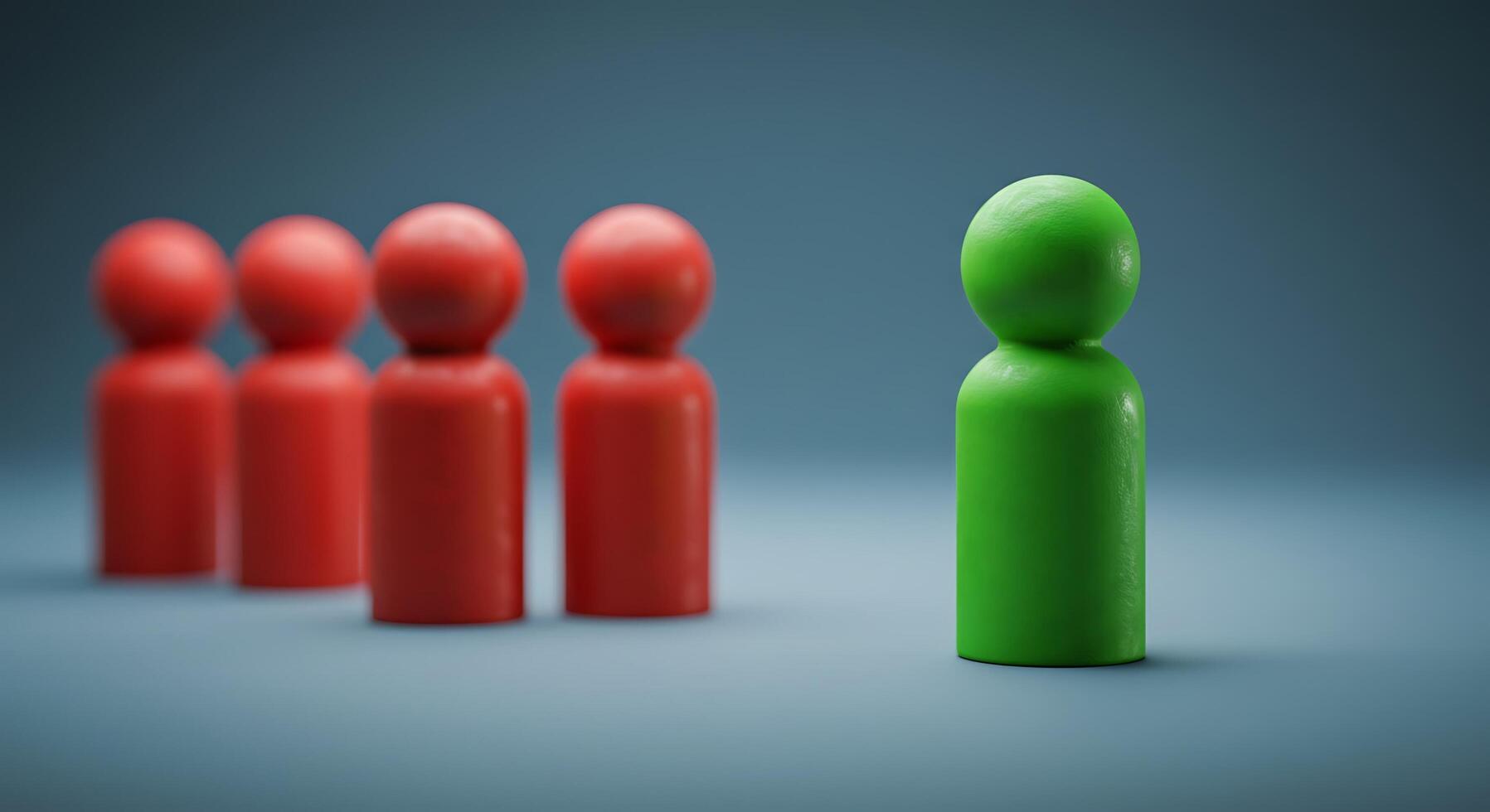 Isolated Green Figure Among Red Figures on a Neutral Background photo