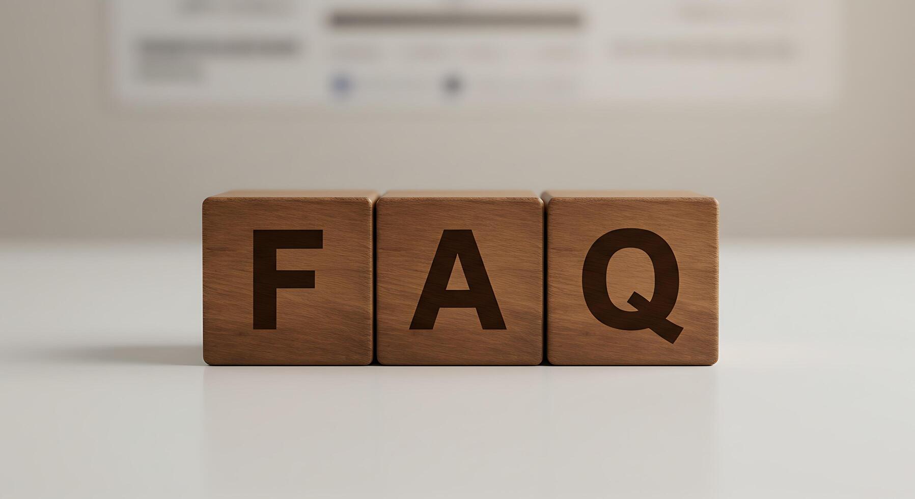 Wooden Blocks Spelling FAQ on White Surface with Blurred Backgro photo