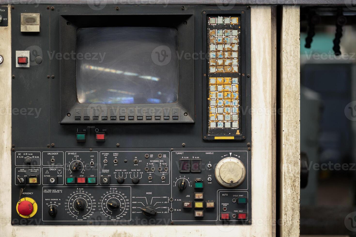 old lathe machine monitor control panel with button switch for metal CNC operating program photo