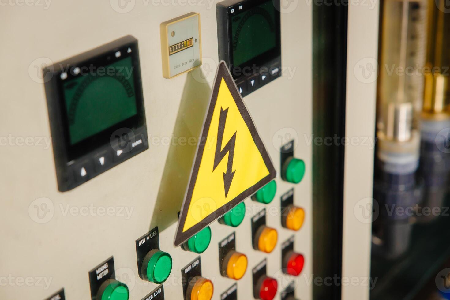 high voltage electric box, Electricity control panel with bottle machine operator in factory photo