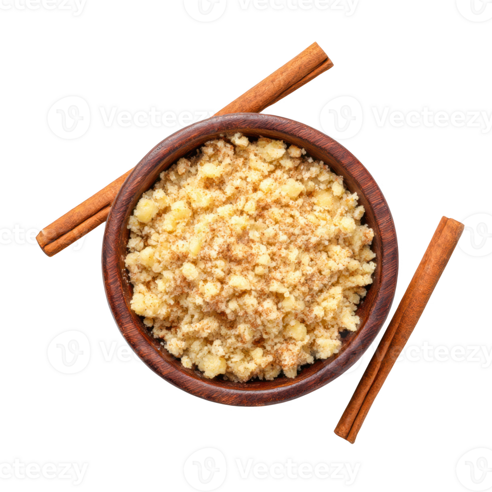 Bowl of crumble with cinnamon sticks isolated on transparent background. png