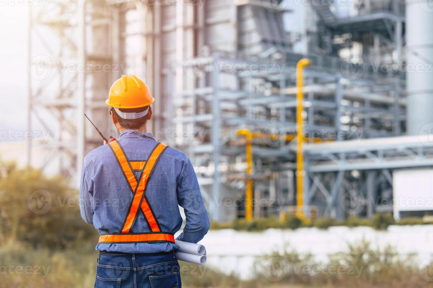 Petroleum Refinery engineer male working building oil and gas power industrial plant. photo