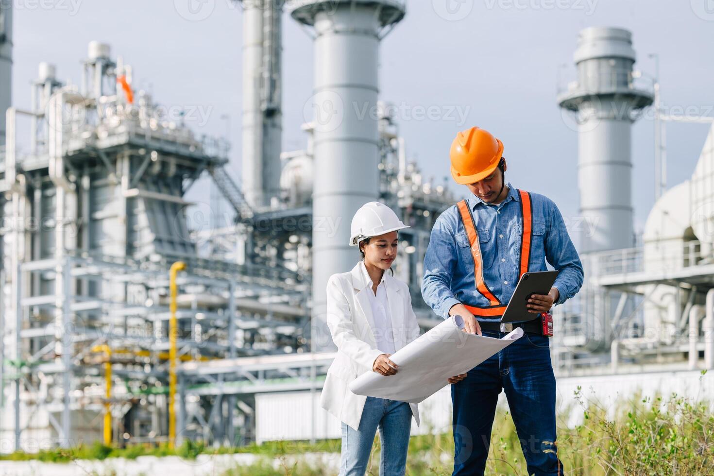Team Petroleum Refinery engineer team working building oil and gas power industrial plant. photo