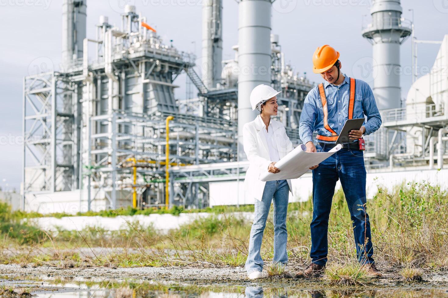 Professional Petroleum Refinery engineer working building oil and gas power industrial plant. photo