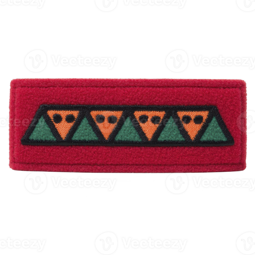 This shows red fabric patch with geometric design featuring alternating green and orange triangles. pattern is simple and symmetrical, creating bold visual effect.Red fabric patch with geometric png