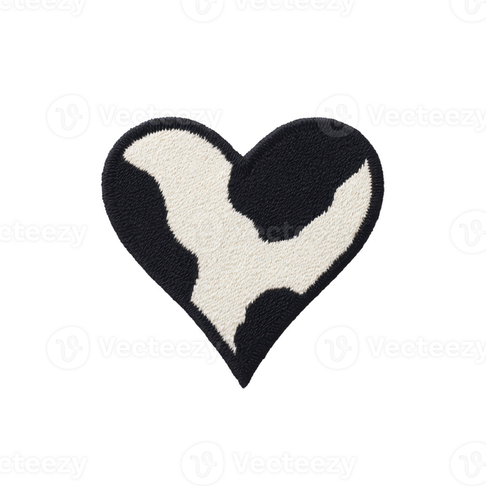 Heart shaped patch with black and white cow print pattern, resembling playful and unique design. texture appears soft and embroidered, adding tactile element png