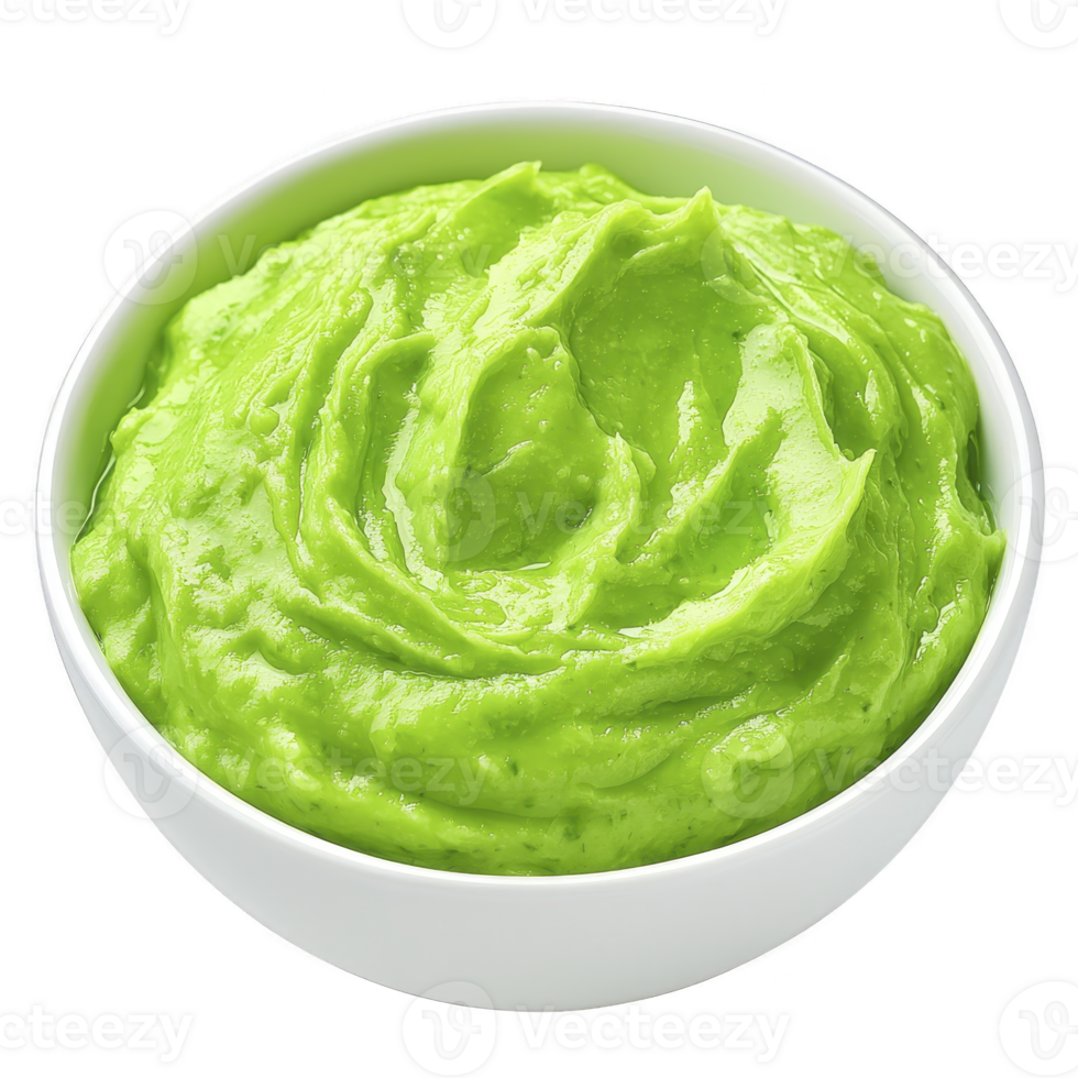 Bowl of creamy, vibrant green avocado puree, perfect for dips or spreads, is displayed in white bowl. smooth texture and rich color make it visually appealing and appetizing png