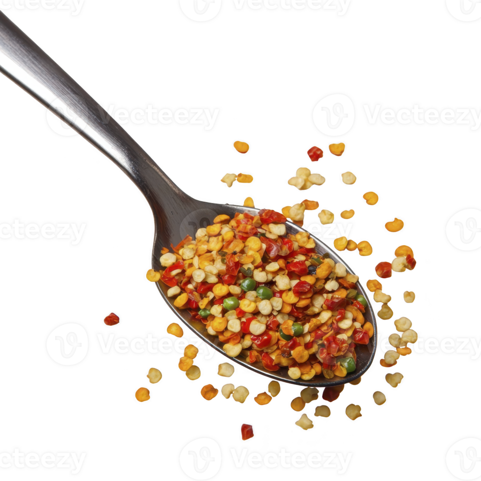 Spoon filled with vibrant, colorful chili flakes and seeds, showcasing mix of red, yellow, and green hues, spills onto white surface, adding spicy and flavorful touch png