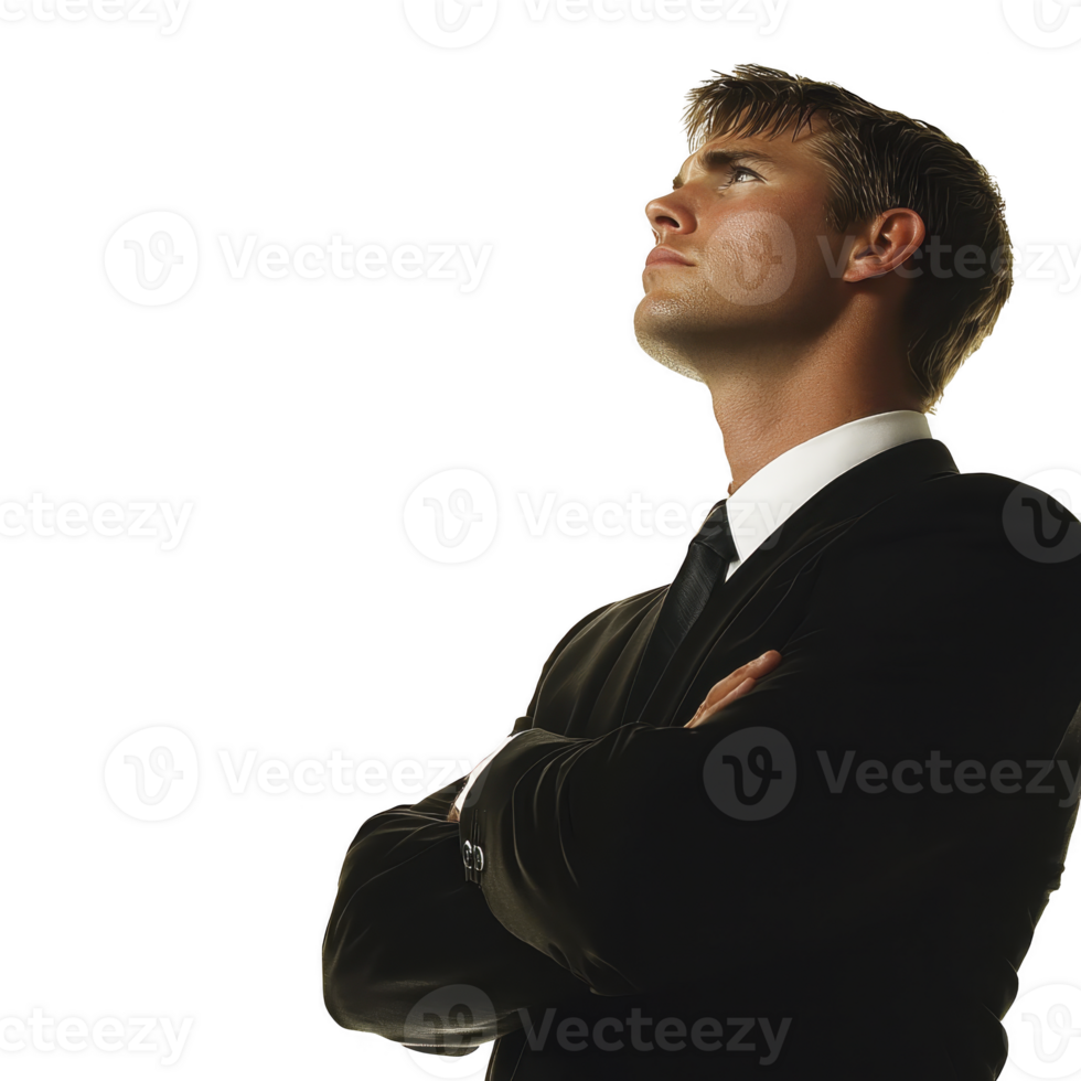 confident man in suit looks upward with arms crossed, symbolizing ambition and determination. professional attire and focused expression convey sense of purpose and aspiration png