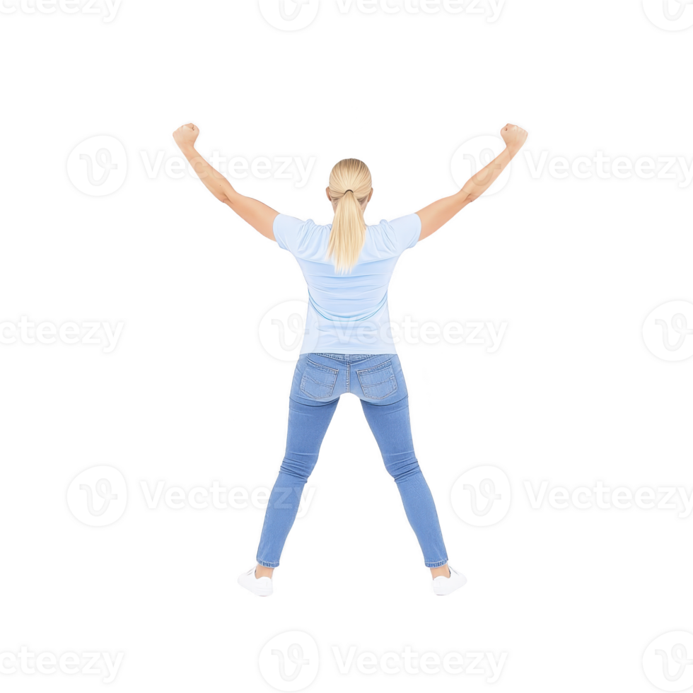 woman with blonde hair stands confidently with arms raised, wearing light blue shirt and jeans, viewed from back. pose conveys sense of victory and empowerment png