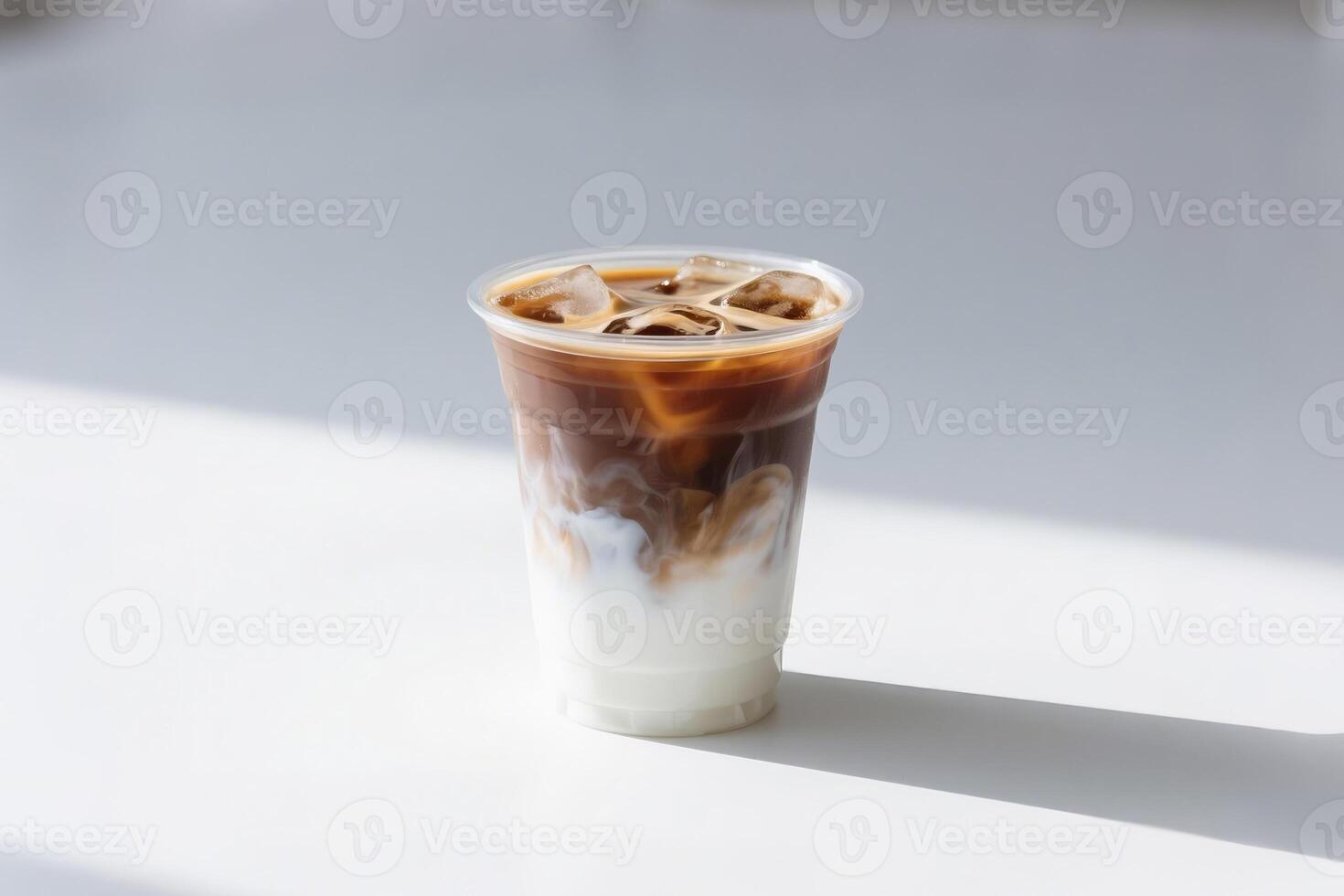 Cold Brew With Milk Served In A Clear Cup On A Clean White Background photo