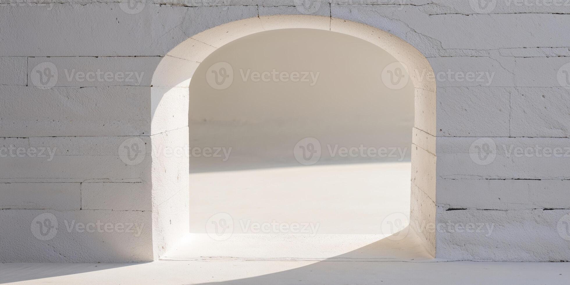 A white archway in a white building photo