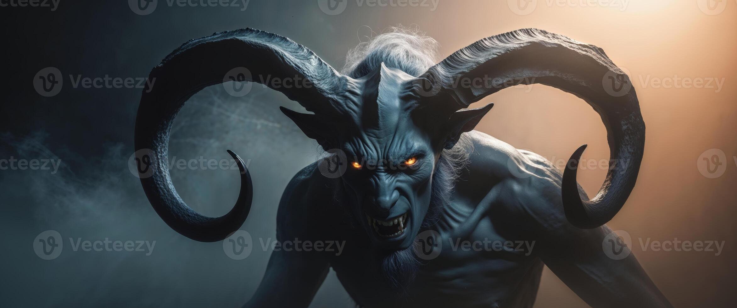 Dark demon with horns emerging from shadows into bright light. photo