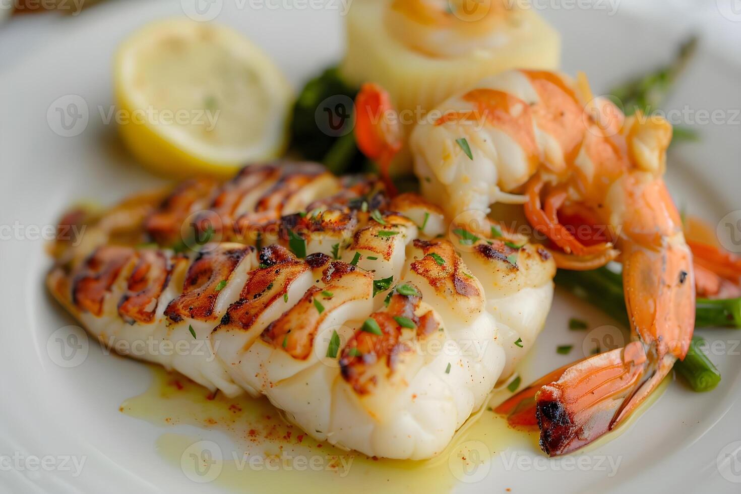 Grilled Seafood Platter Sizzling Shrimp and Succulent Squid with Lemon Herb Garnish, Served with Grilled Asparagus and Olive Oil Drizzle. Delicious Summer Meal Idea Recipe. photo