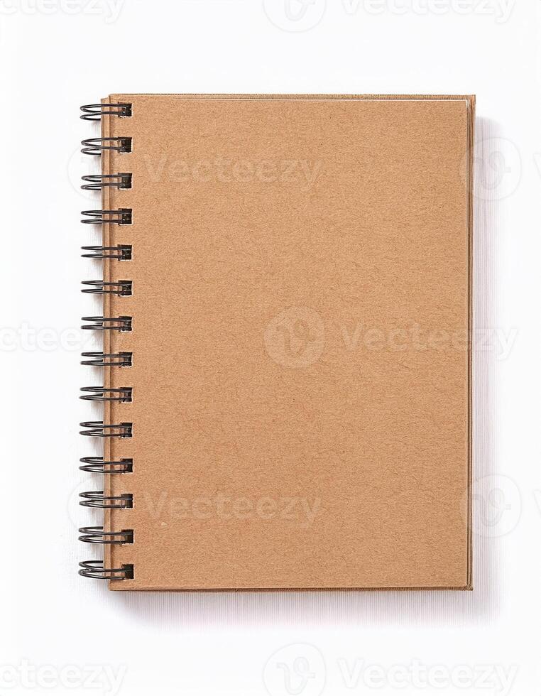 Blank Kraft Paper Spiral Notebook Isolated on White Background Perfect for Note Taking and Journaling photo