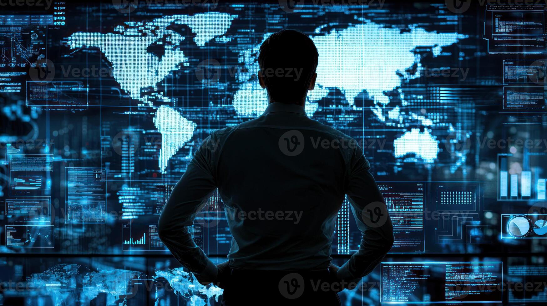 A man standing in front of a large, illuminated world map on a digital display, with his hands on his hips, looking at the map with a serious expression. photo