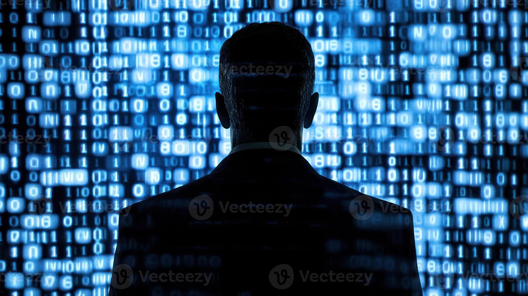 A man in a suit standing in front of a digital binary code background. photo