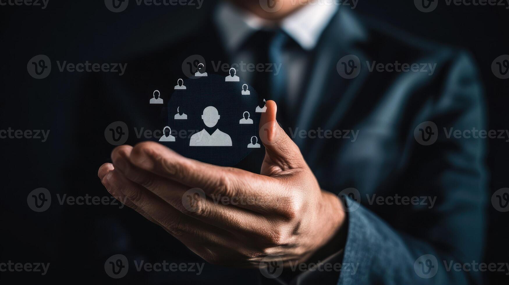 A businessman holding a virtual screen with a digital icon of a person and a house, with a blurred background. photo