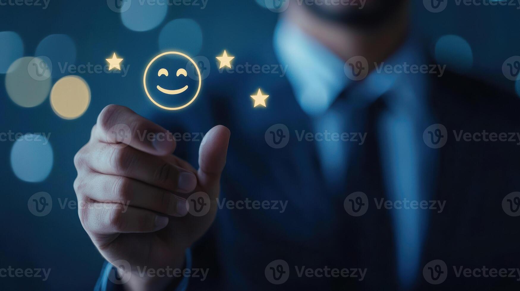 A man in a suit holding a glowing smiley face icon with five stars above his hand. photo