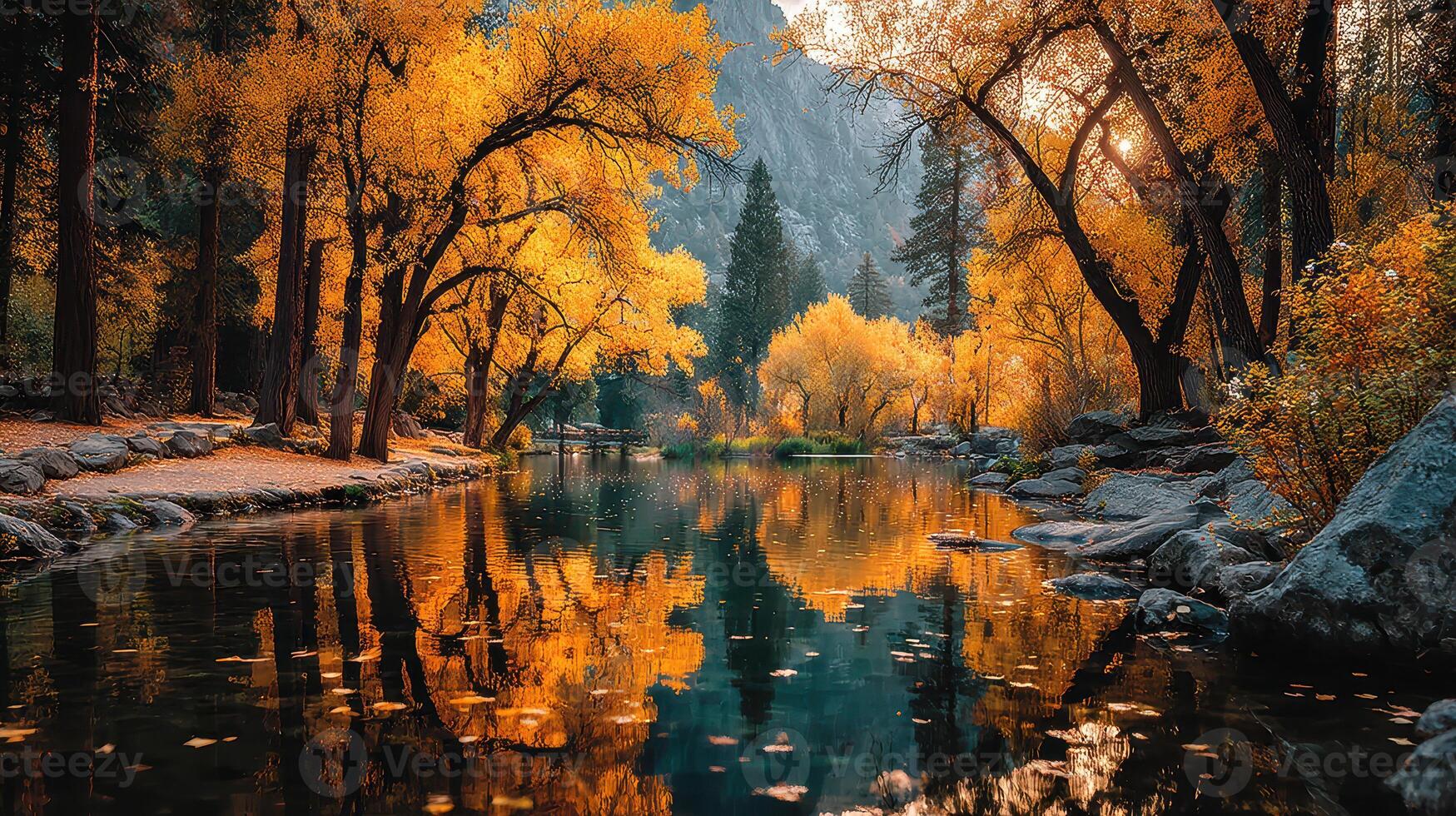 Vibrant autumn foliage reflects in a serene river surrounded by trees at golden hour near a mountain range photo