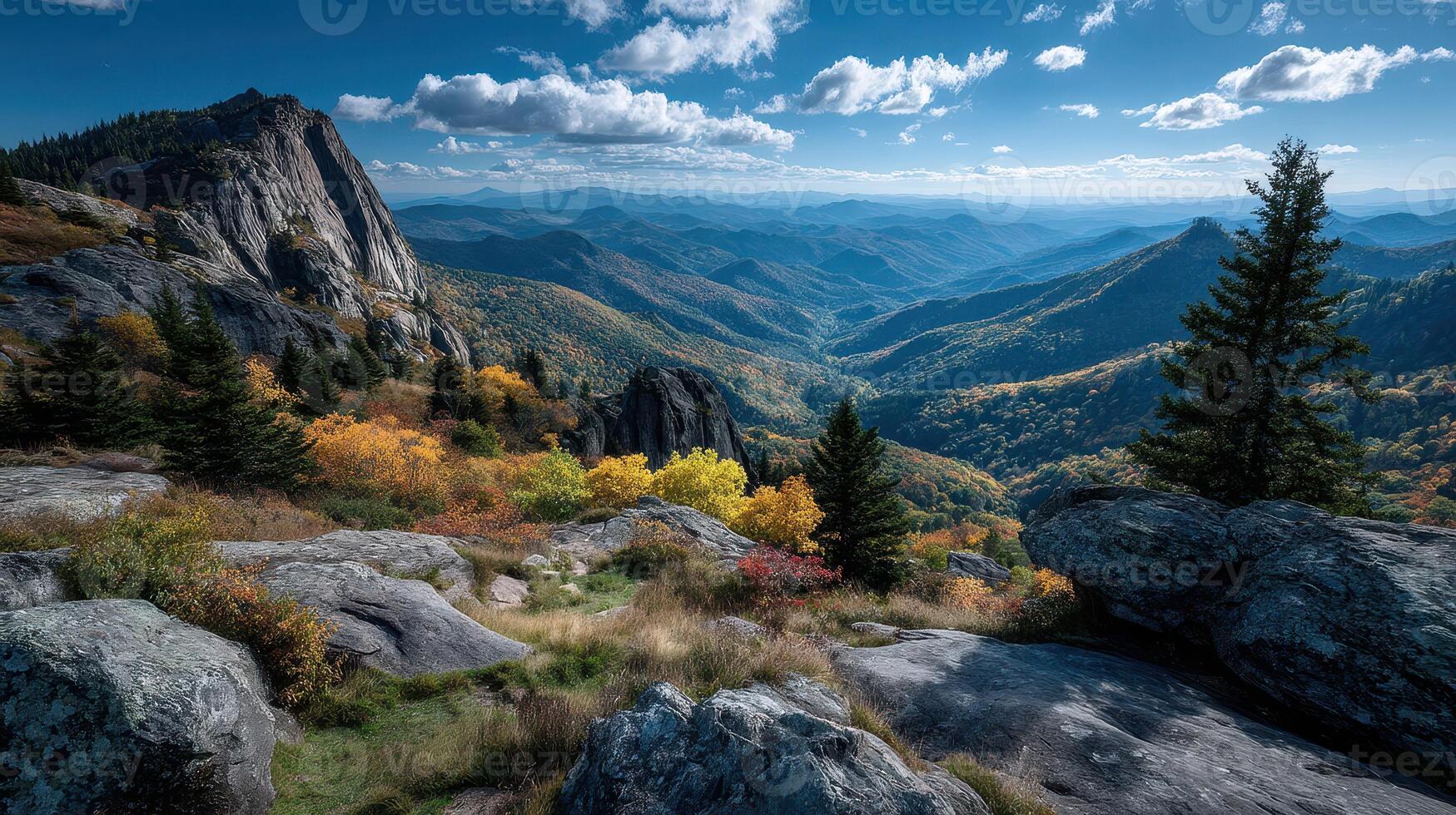 Colorful autumn landscape view from a rocky mountain overlooking a valley in the Blue Ridge Mountains during midday photo