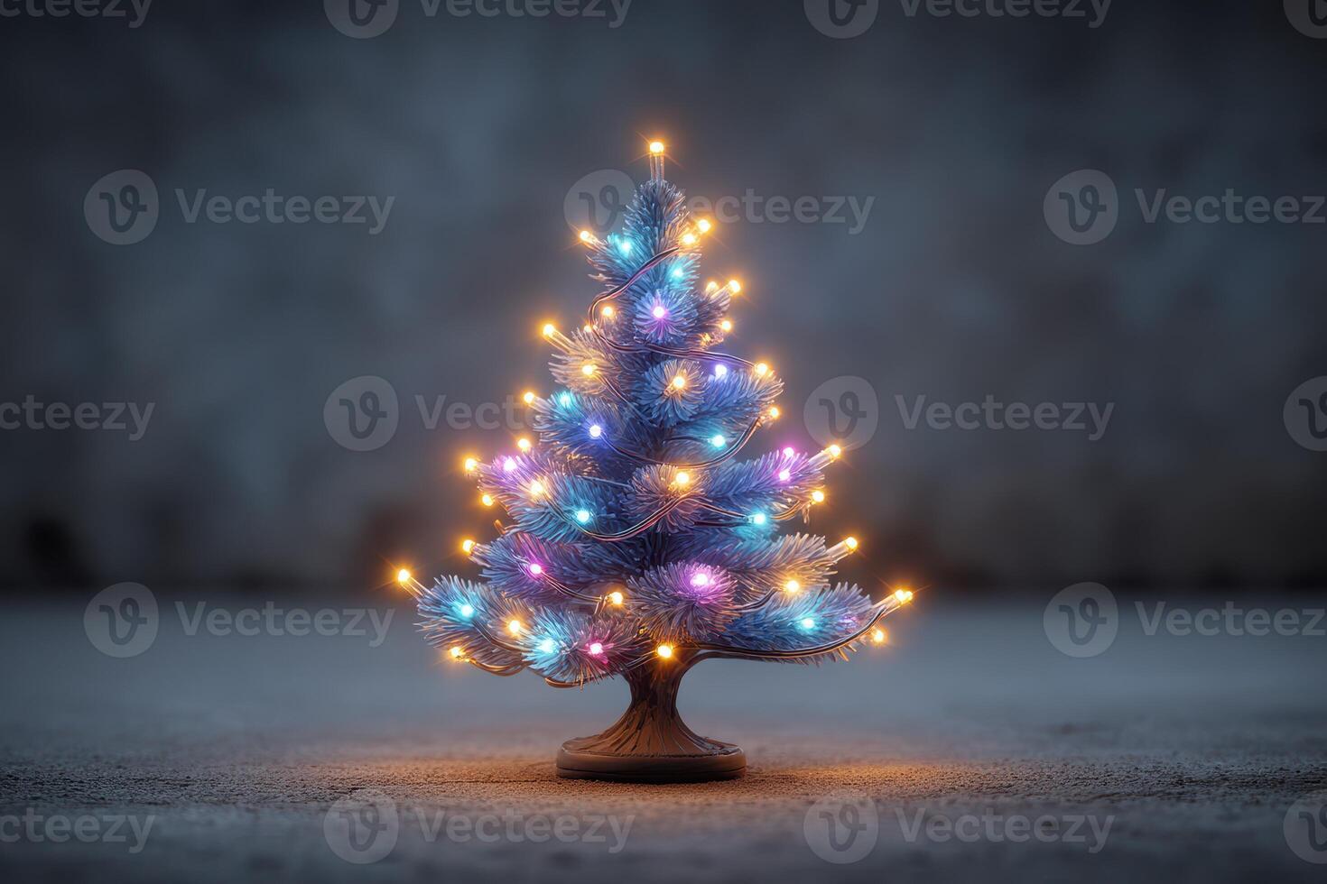 Colorful illuminated mini Christmas tree displayed indoors during festive season photo