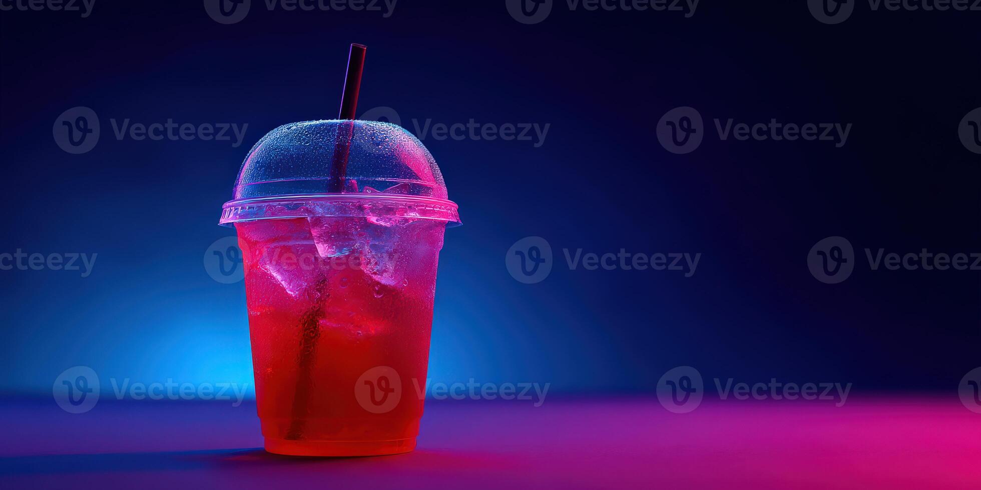 Refreshing beverage with ice in colorful lighting photo