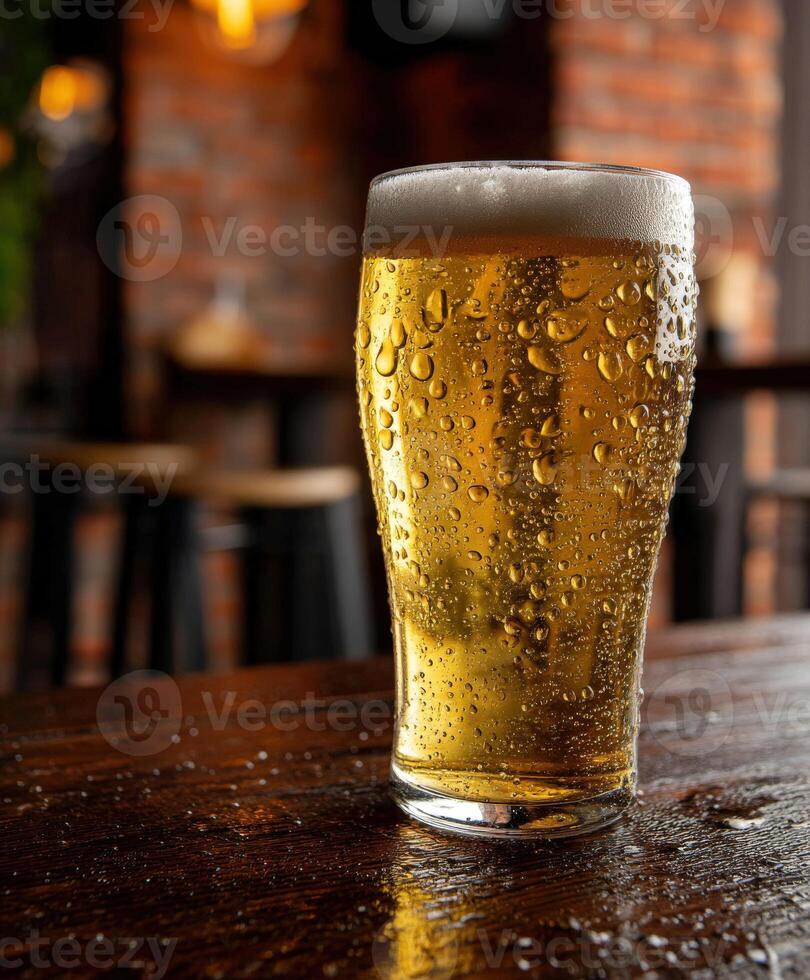 Refreshing beer glass on a wooden table in a pub setting photo
