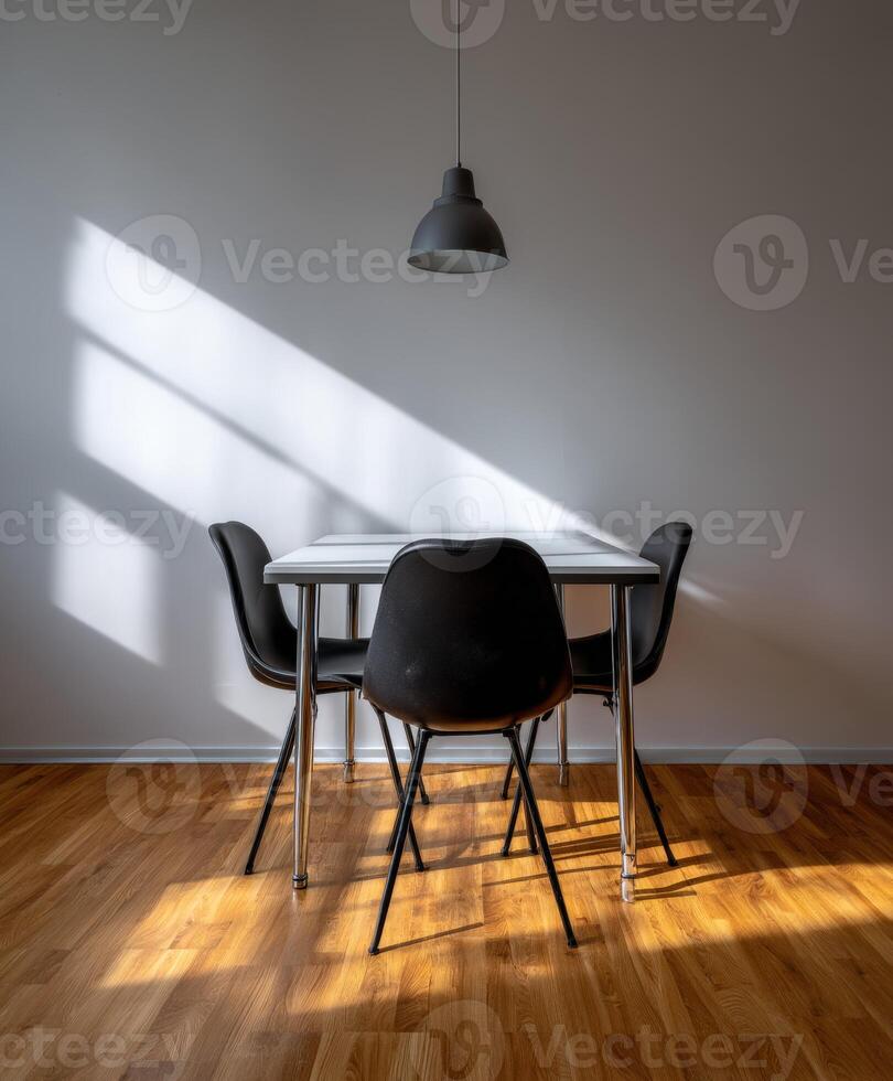 Modern interior design with a minimalist dining table and chairs photo