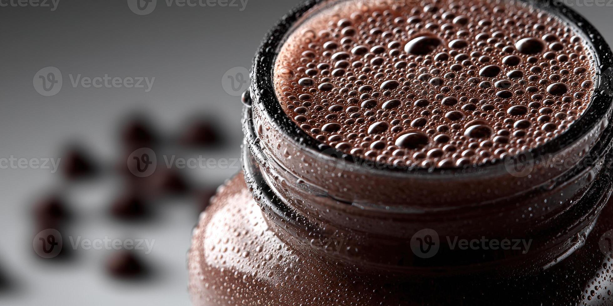 Indulgent protein shake surrounded by chocolate droplets for energy boost photo