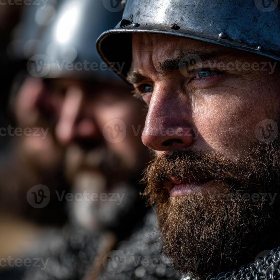 Warriors in full armor focused on their battle preparations photo