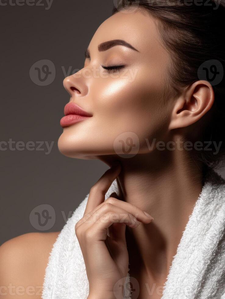 Model showcasing elegant skincare routine in a studio setting photo