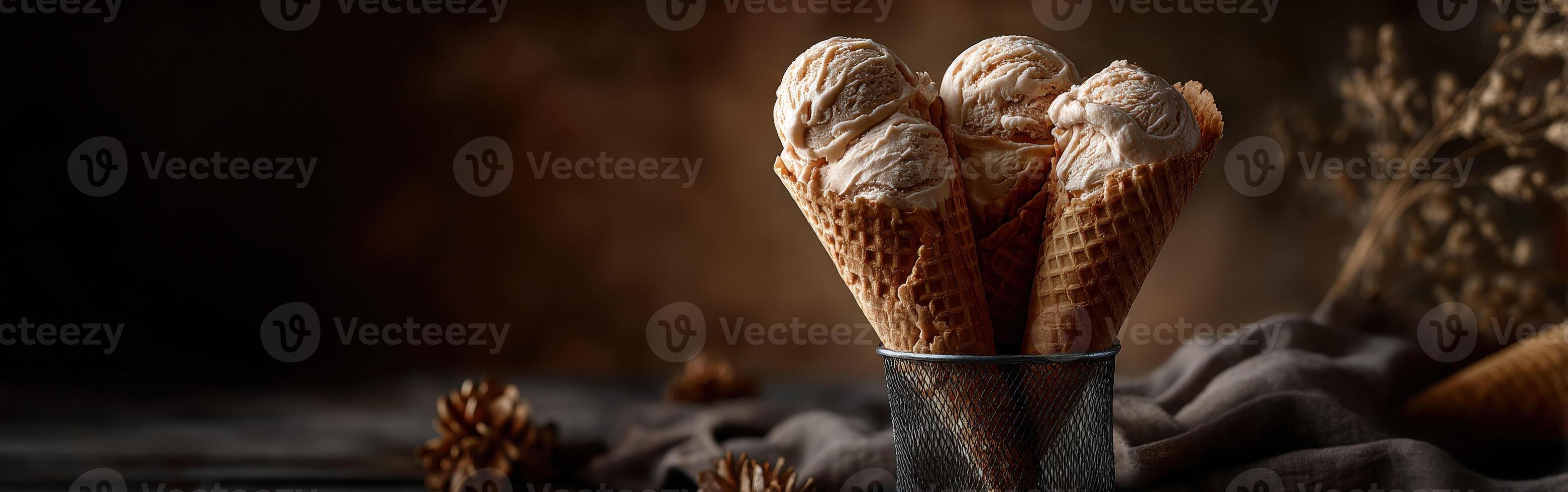 Ice cream cones in a rustic setting with warm lighting and natural elements photo