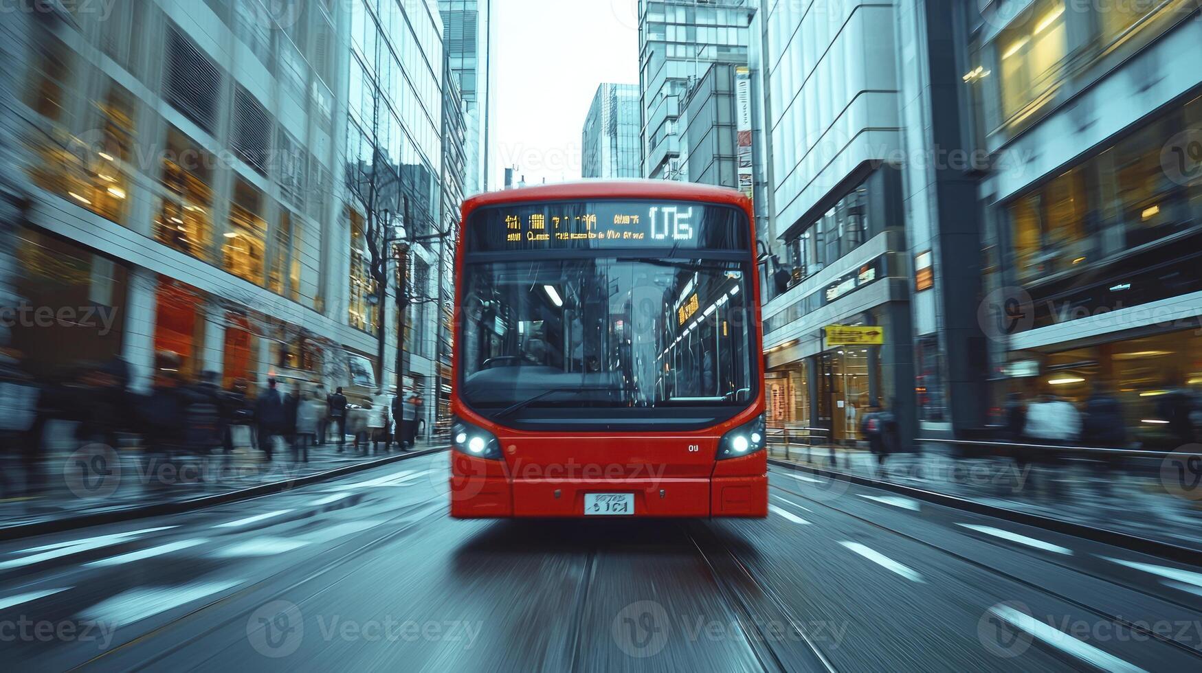 A red bus driving down a city street photo