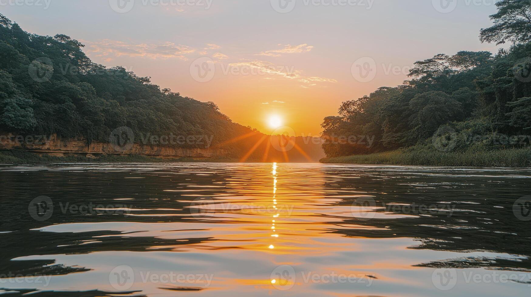 A river with the sun setting behind it photo