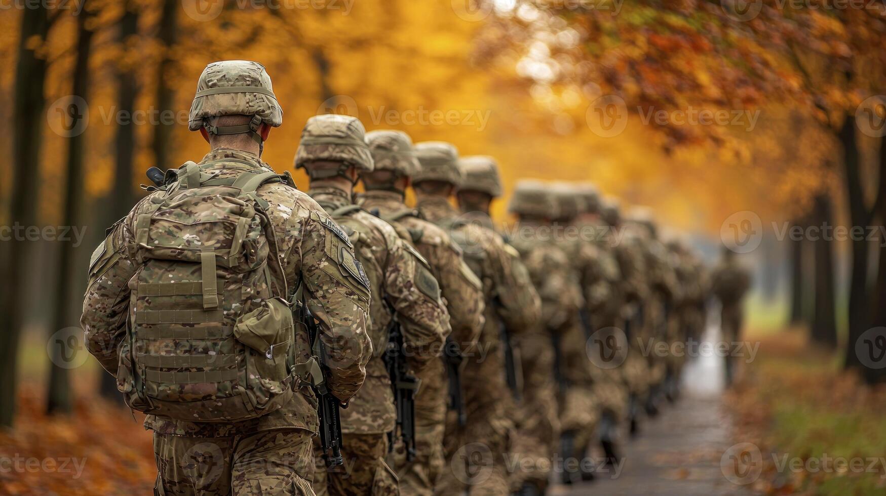A group of soldiers walking down a path photo