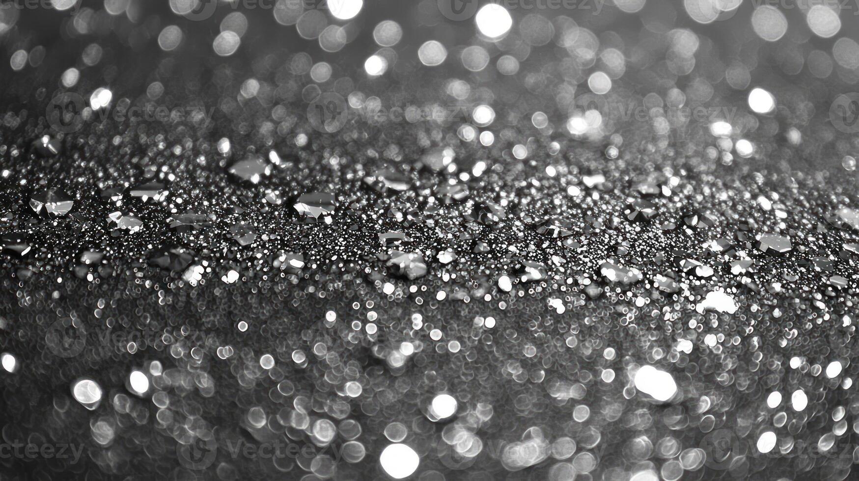 Black and white photo of rain drops on a surface