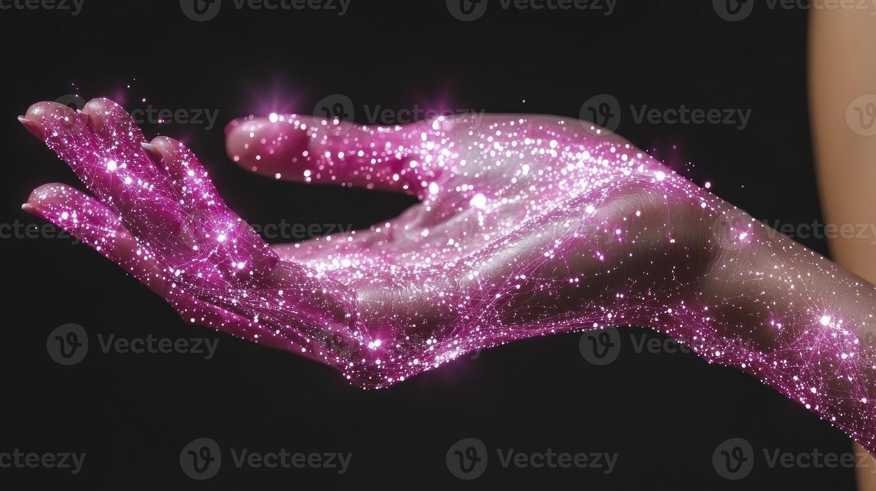 A woman's hand is covered in pink glitter photo