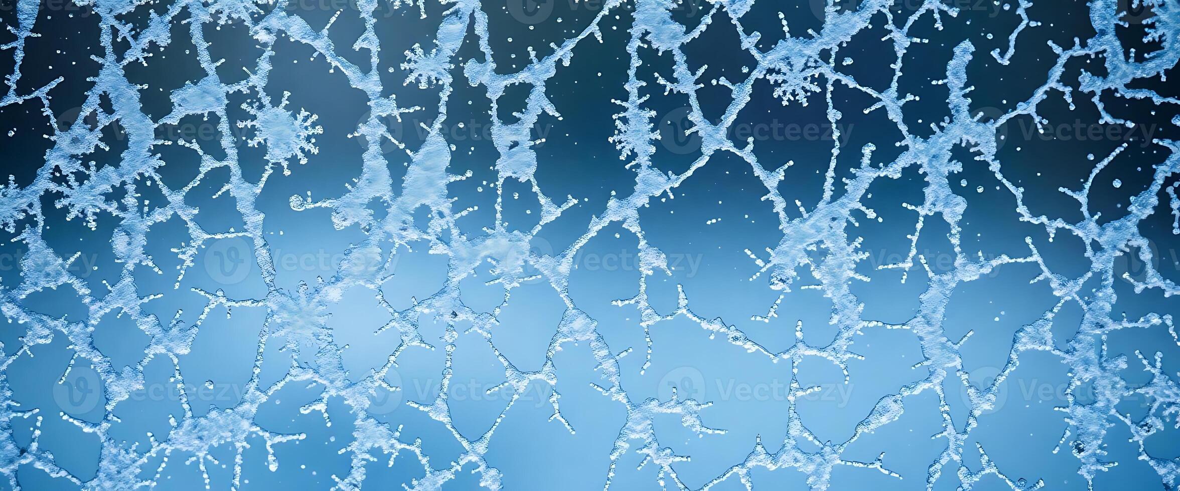 close up of a frosted window with a blue background photo