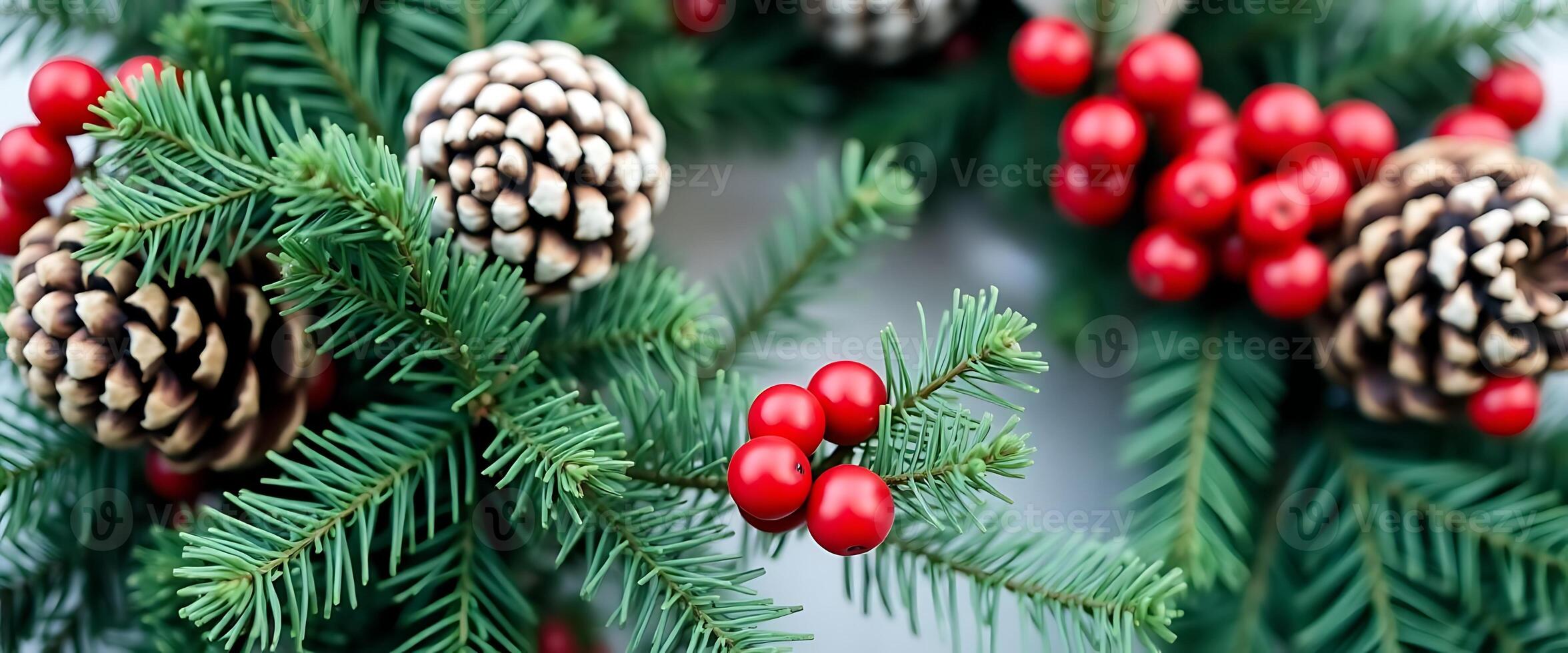 close up of a pine cone and red berries photo