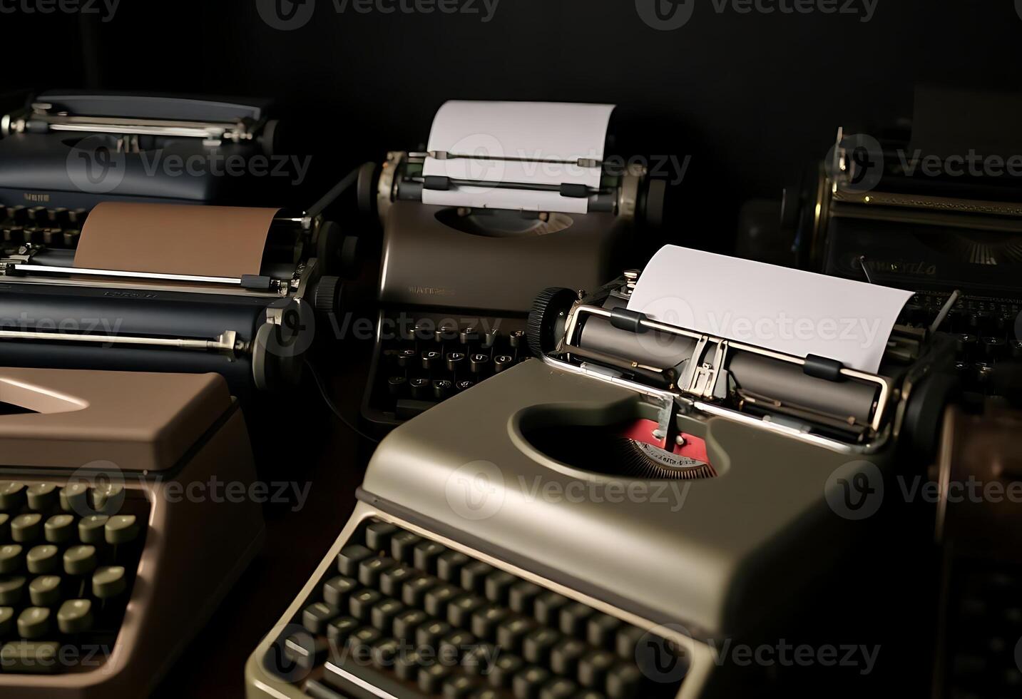 row of old typewriters sitting next to each other photo