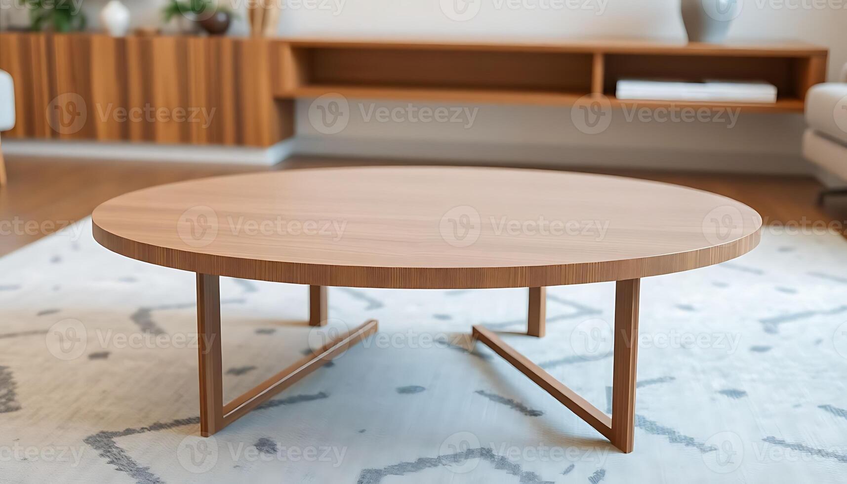 wooden table sitting on top of a rug in a living room photo