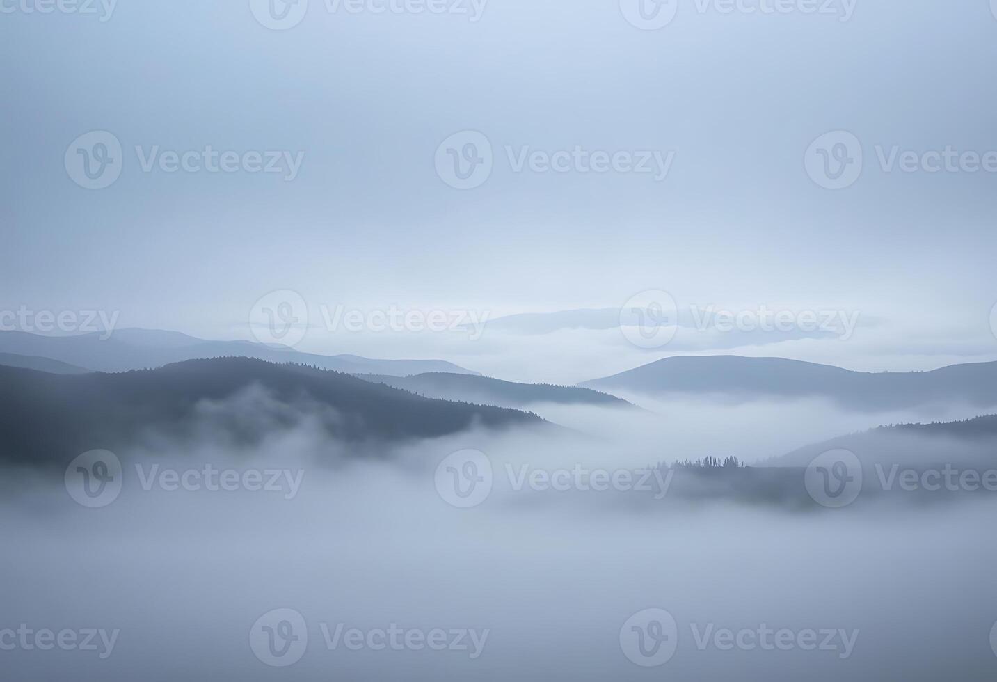 foggy landscape with mountains in the distance photo